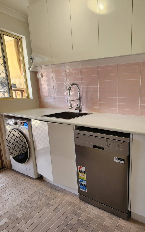 Laundry Renovation Duncraig showcasing a bright, functional laundry with custom cabinets and contemporary fixtures.