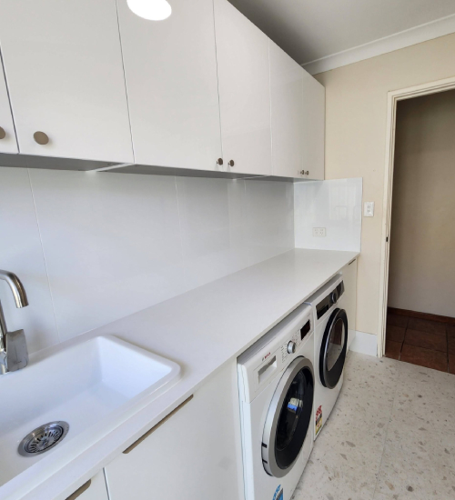 Custom Laundry Renovation Duncraig with smart storage solutions, modern benchtops and an efficient layout.